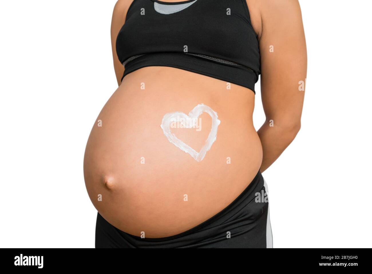 Close up of naked belly of pregnant woman. Stock Photo by puhimec