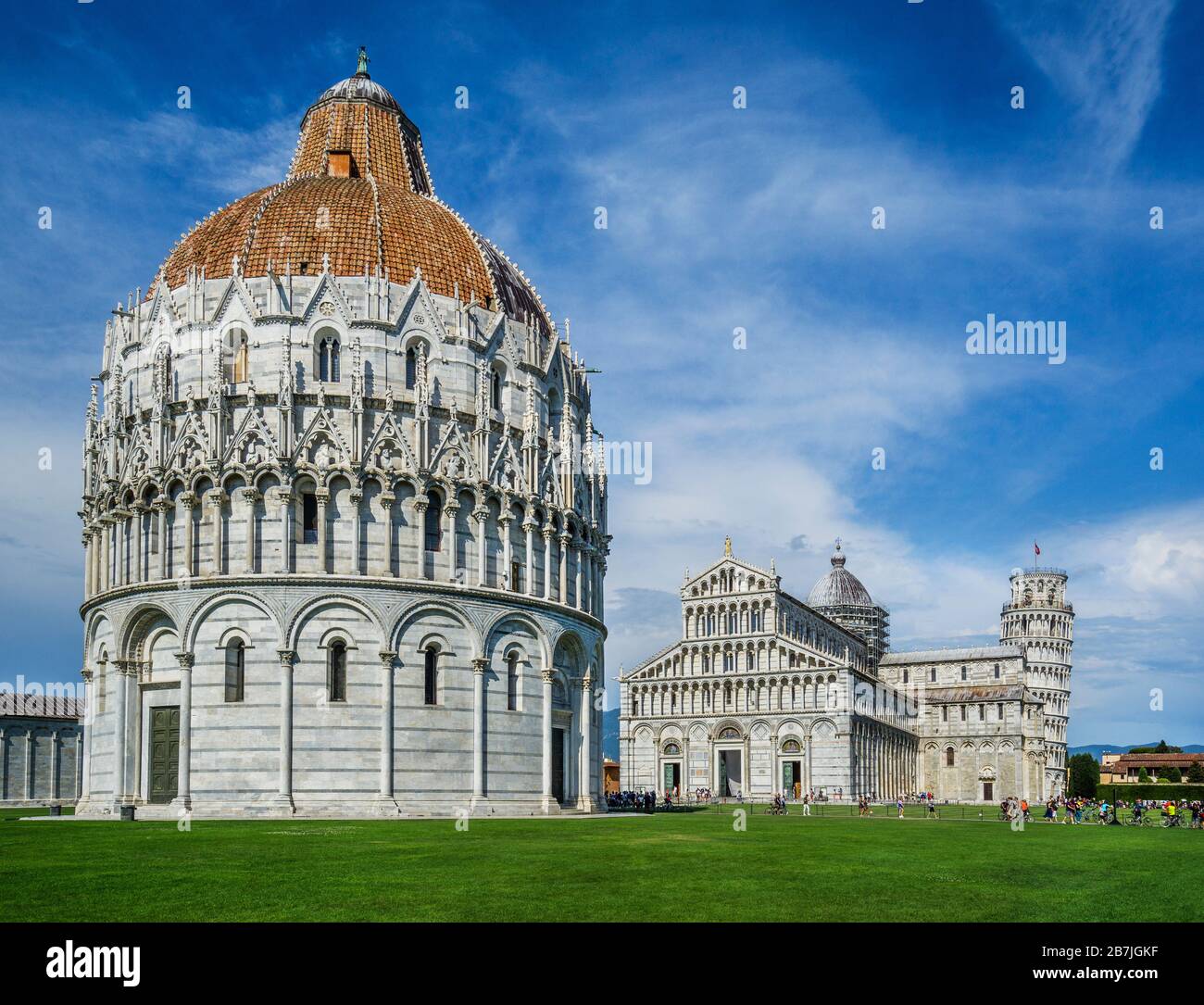 the Pisa Baptistery of St. John in the Piazza dei Miracoli, near the Duomo di Pisa and the cathedral's free-standing campanile, the famous Leaning Tow Stock Photo