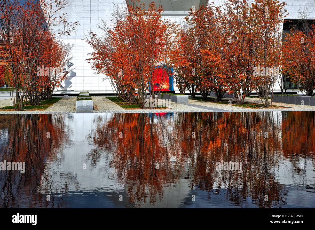 Fall color with a reflection on the pond Stock Photo - Alamy