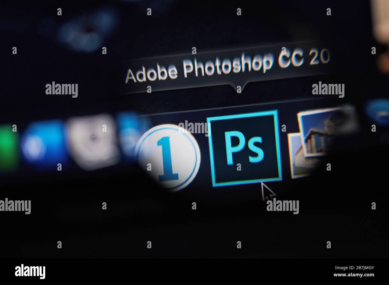 New-York , USA - March 13, 2020: Starting adobe photoshop program on laptop close up view Stock Photo