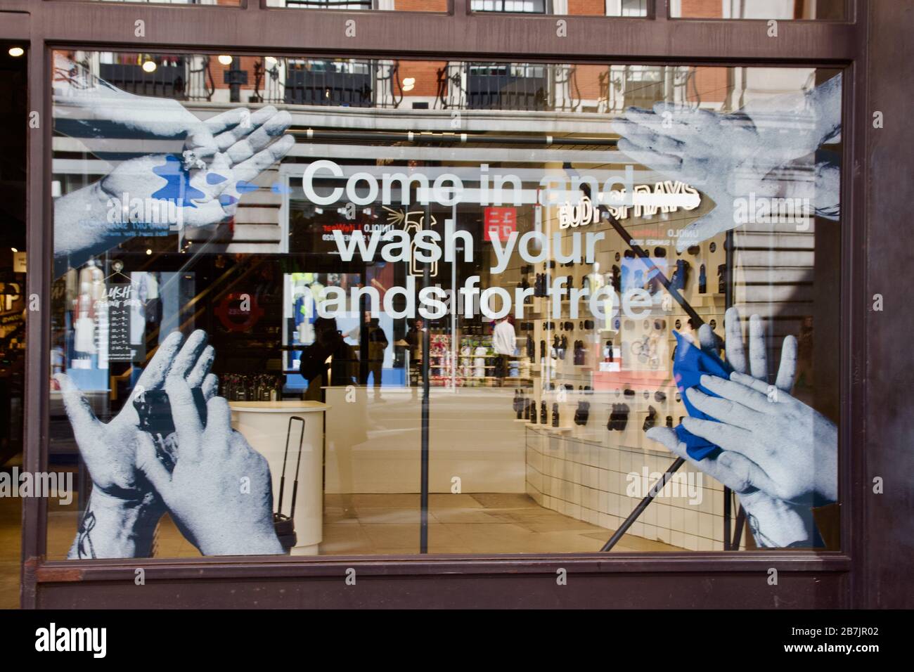 A UK Lush store advertising it's free hand washing service to promote public health with Coronavirus Stock Photo