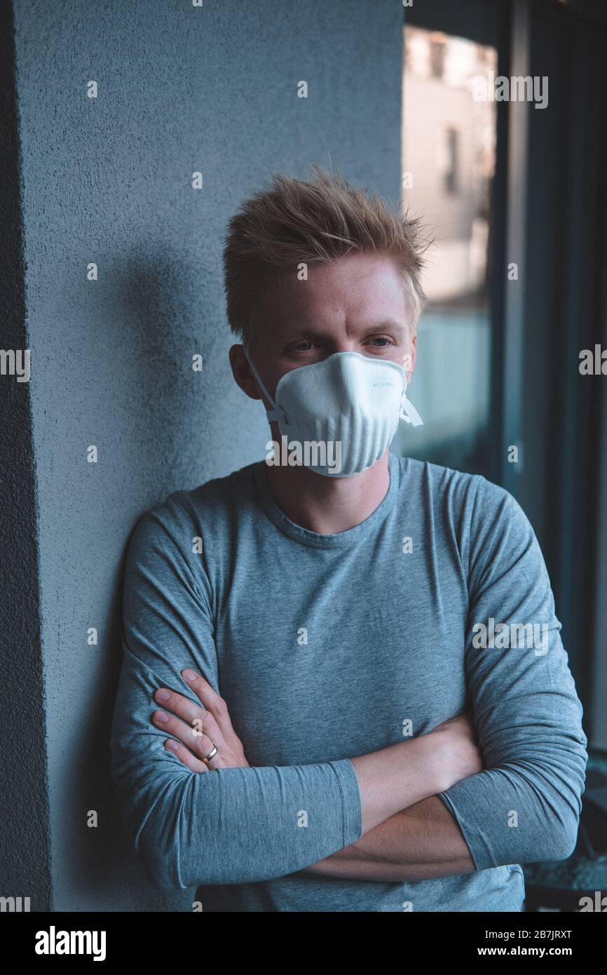 Man wearing FFP3 face mask respirator against flu  Stock Photo