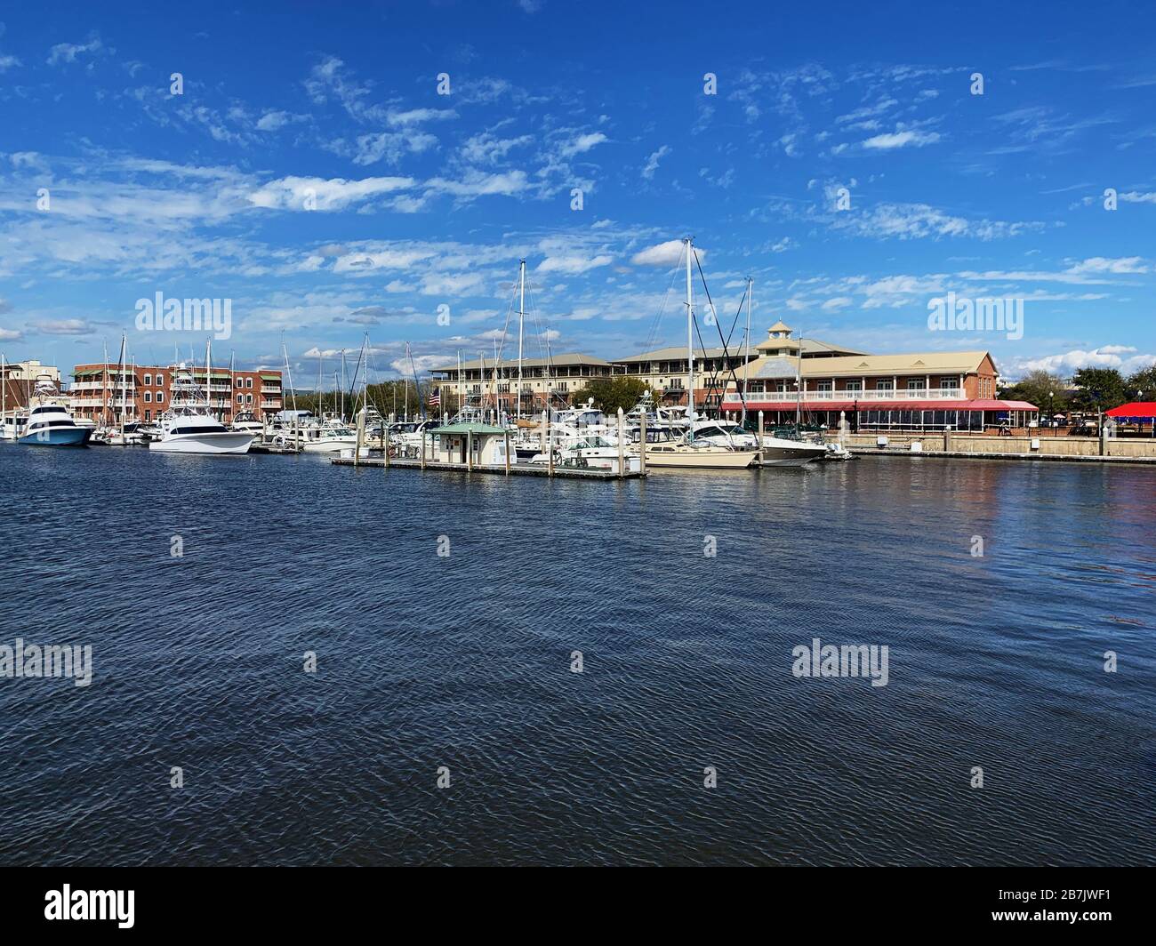 Boats anchored in Pensacola Bay with a view of downtown Pensacola