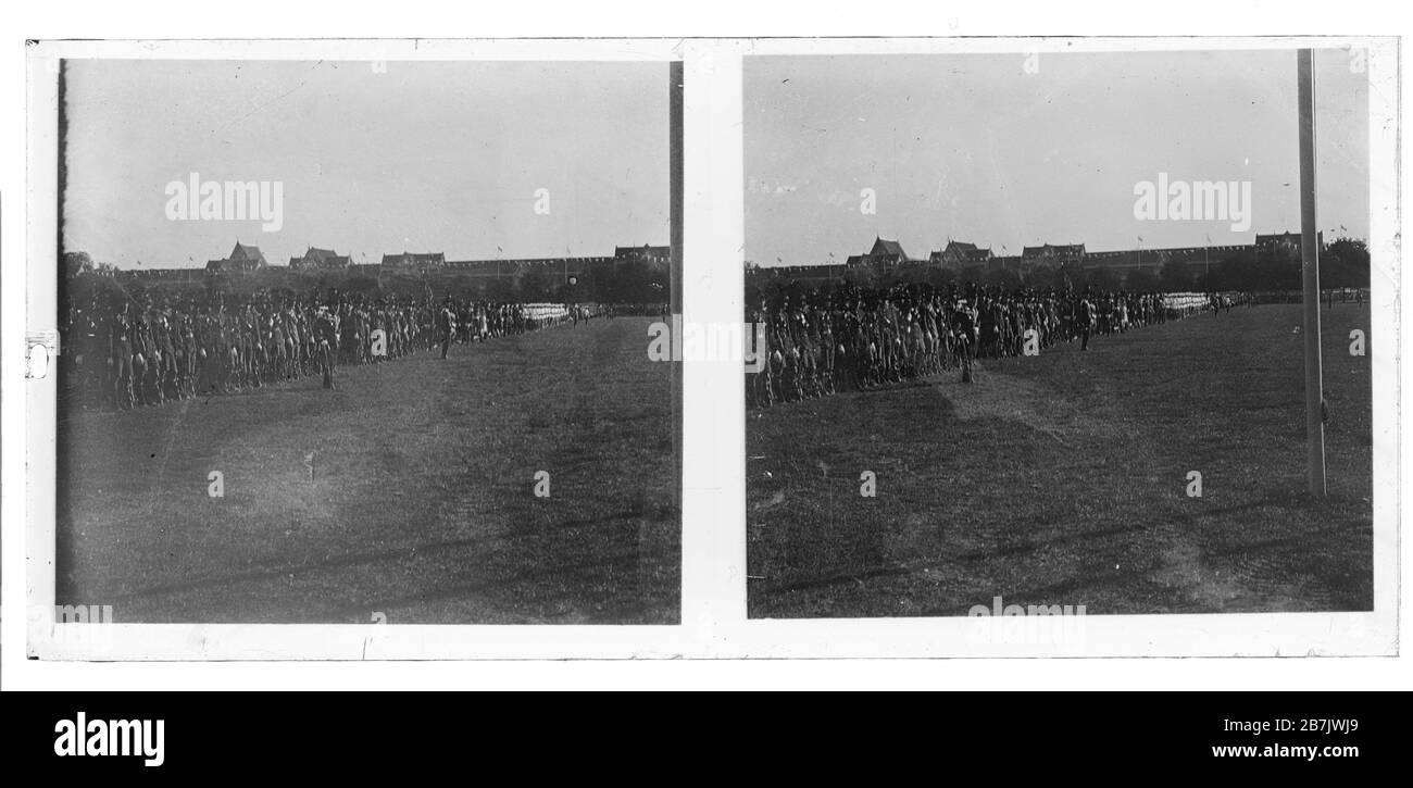 Royal Thai Armed Forces - soldiers in parade uniform lined up on a field for a festive event. Stereoscopic photograph  from  around the year 1910. Photograph on dry glass plate from the Herry W. Schaefer collection. Stock Photo