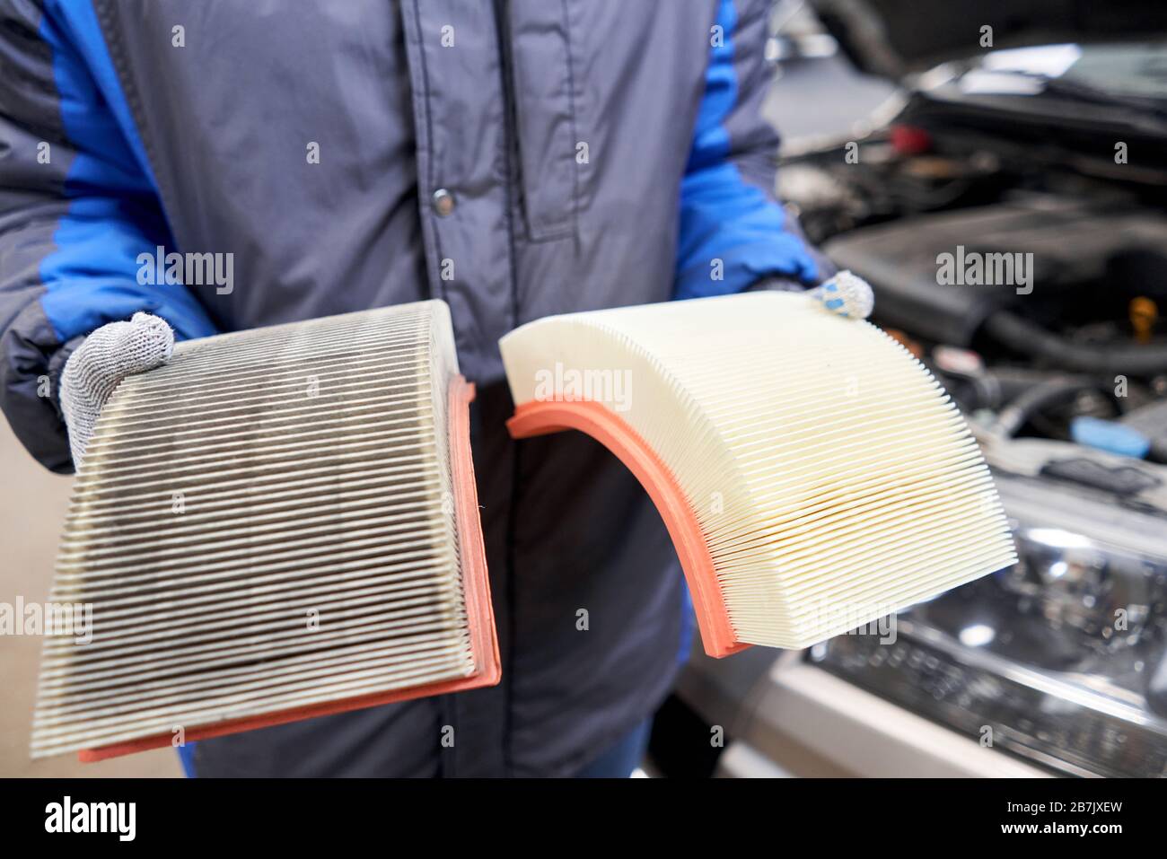 New and old dirty automotive engine air filter in the hands of an auto  mechanic. Auto repair concept Stock Photo - Alamy