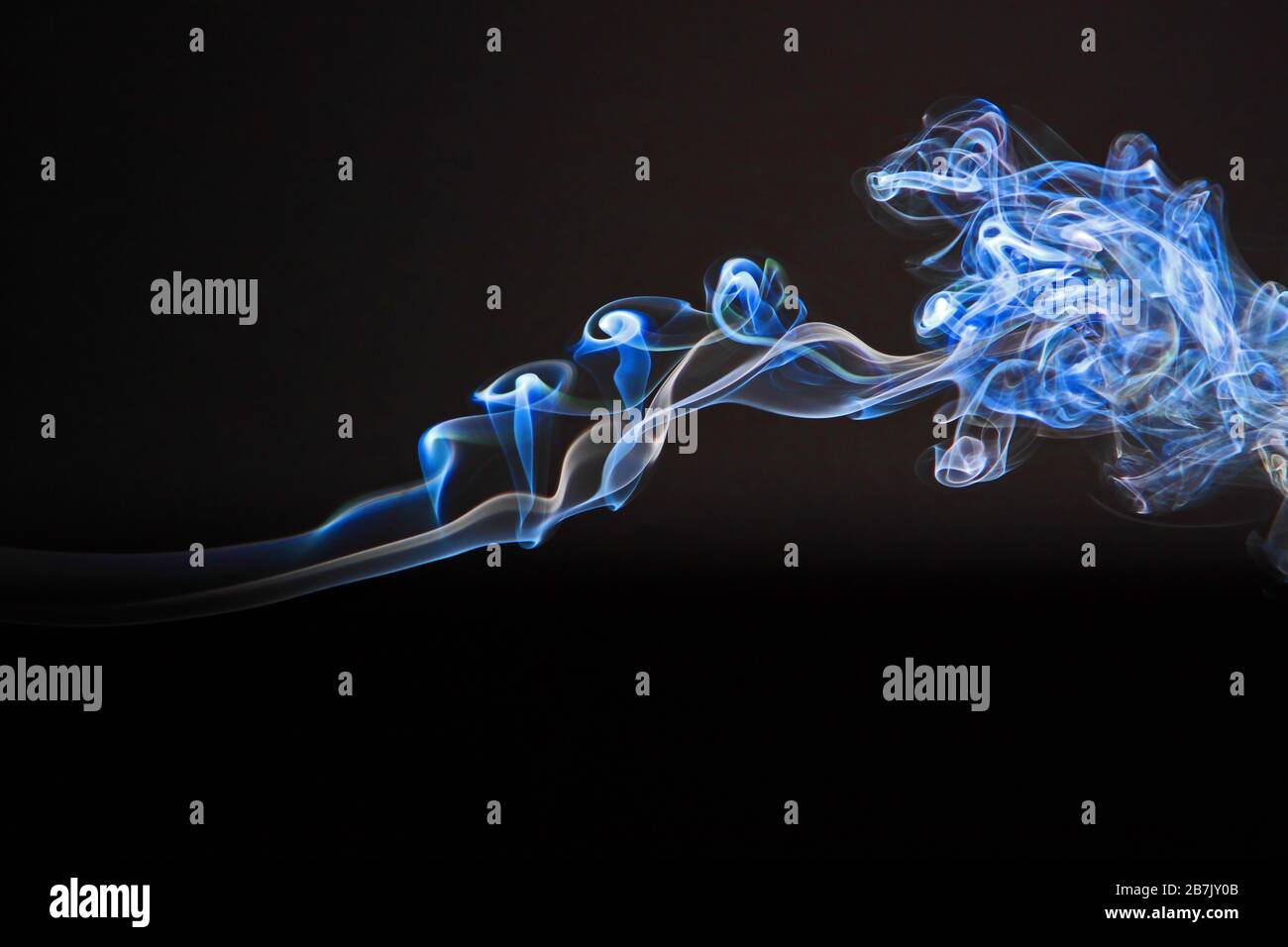 Abstract colored smoke on a black background Stock Photo - Alamy