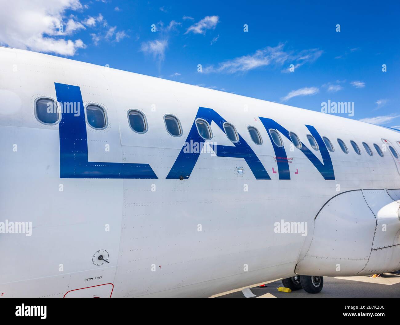 LAN (LATAM Airlines) aircraft on the runway at Teniente Julio Gallardo Airport serving Puerto Natales, Magallanes Region of Patagonia, southern Chile Stock Photo