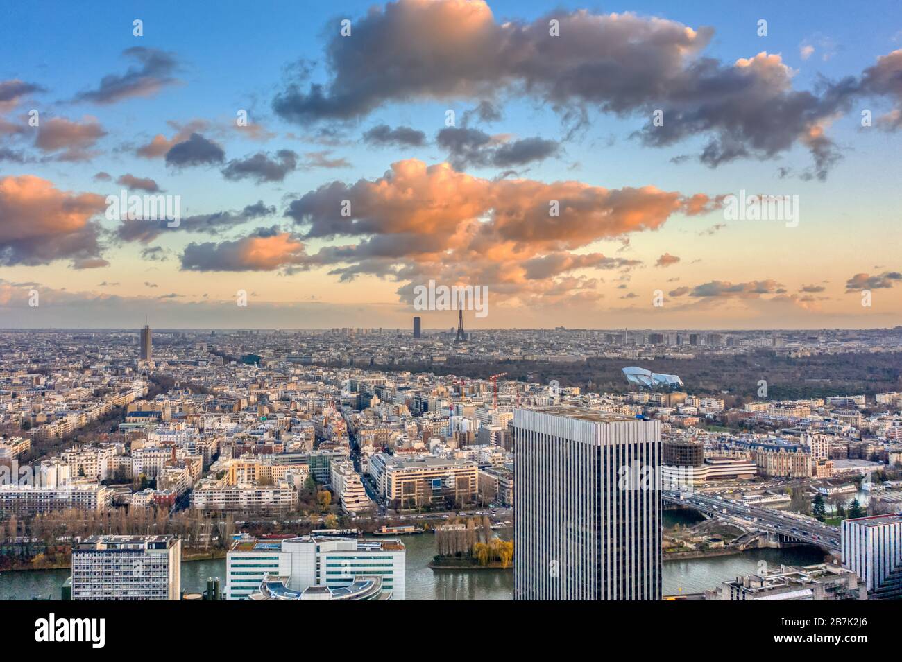 Aerial drone shot of Levallois Paris with Eiffel Tower Hyatt Regency, LV fondation, jardin d'acclimation Stock Photo