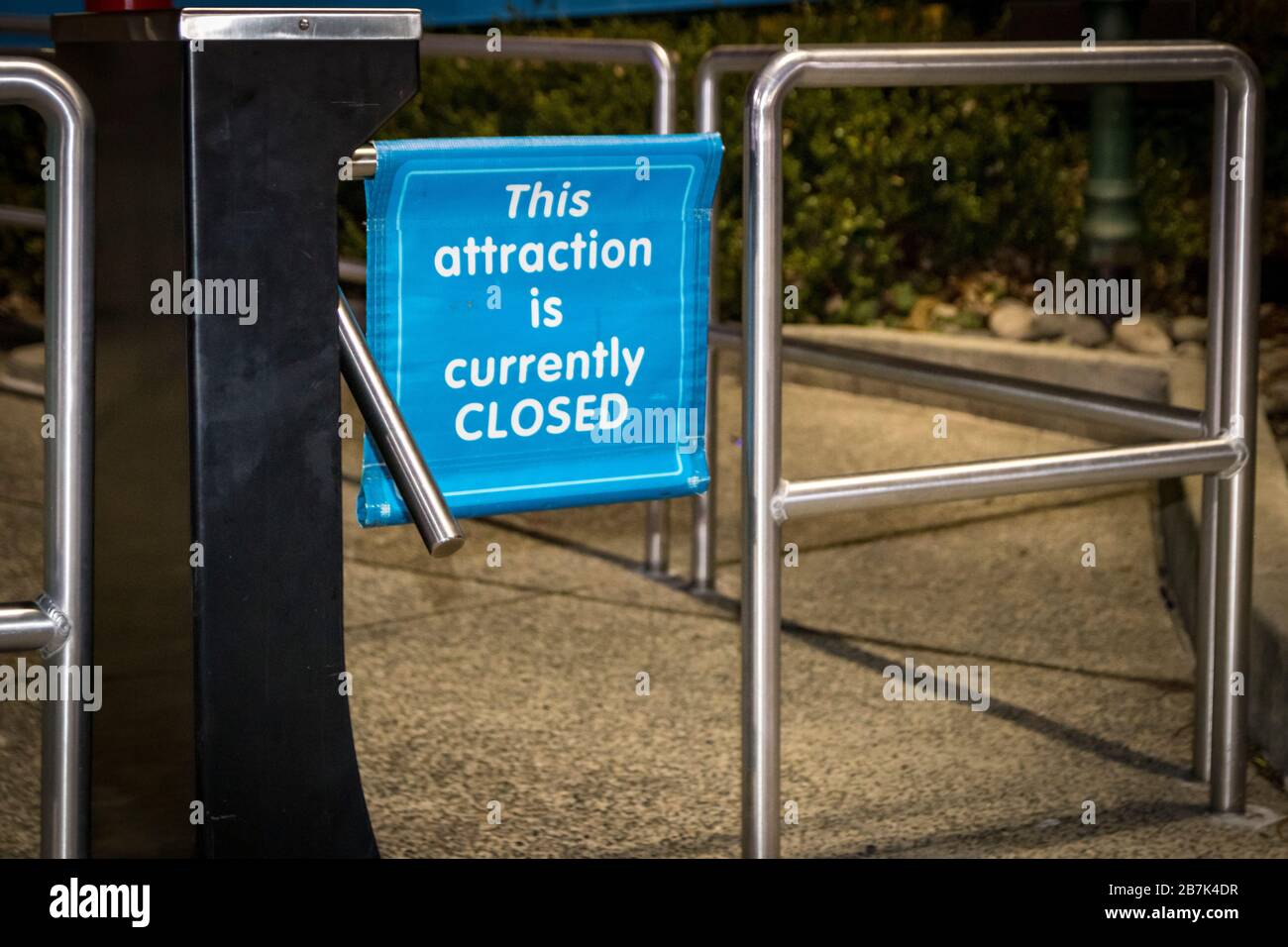 Sign at amusement/theme park attraction turnstile entrance: 