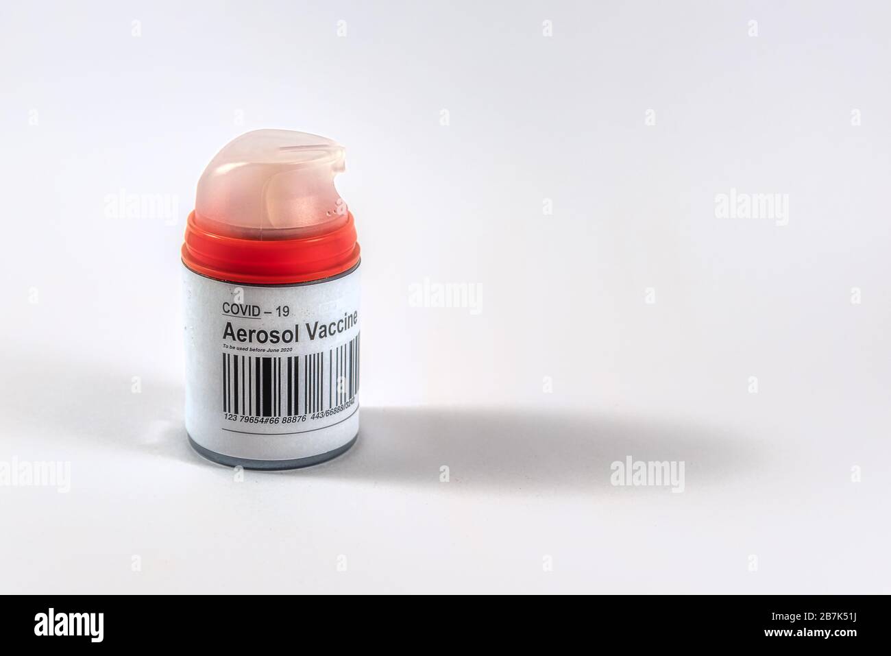 Coronavirus aerosol vaccine???  in a red bottle against white background, Denmark, Mars 17, 2020 Stock Photo