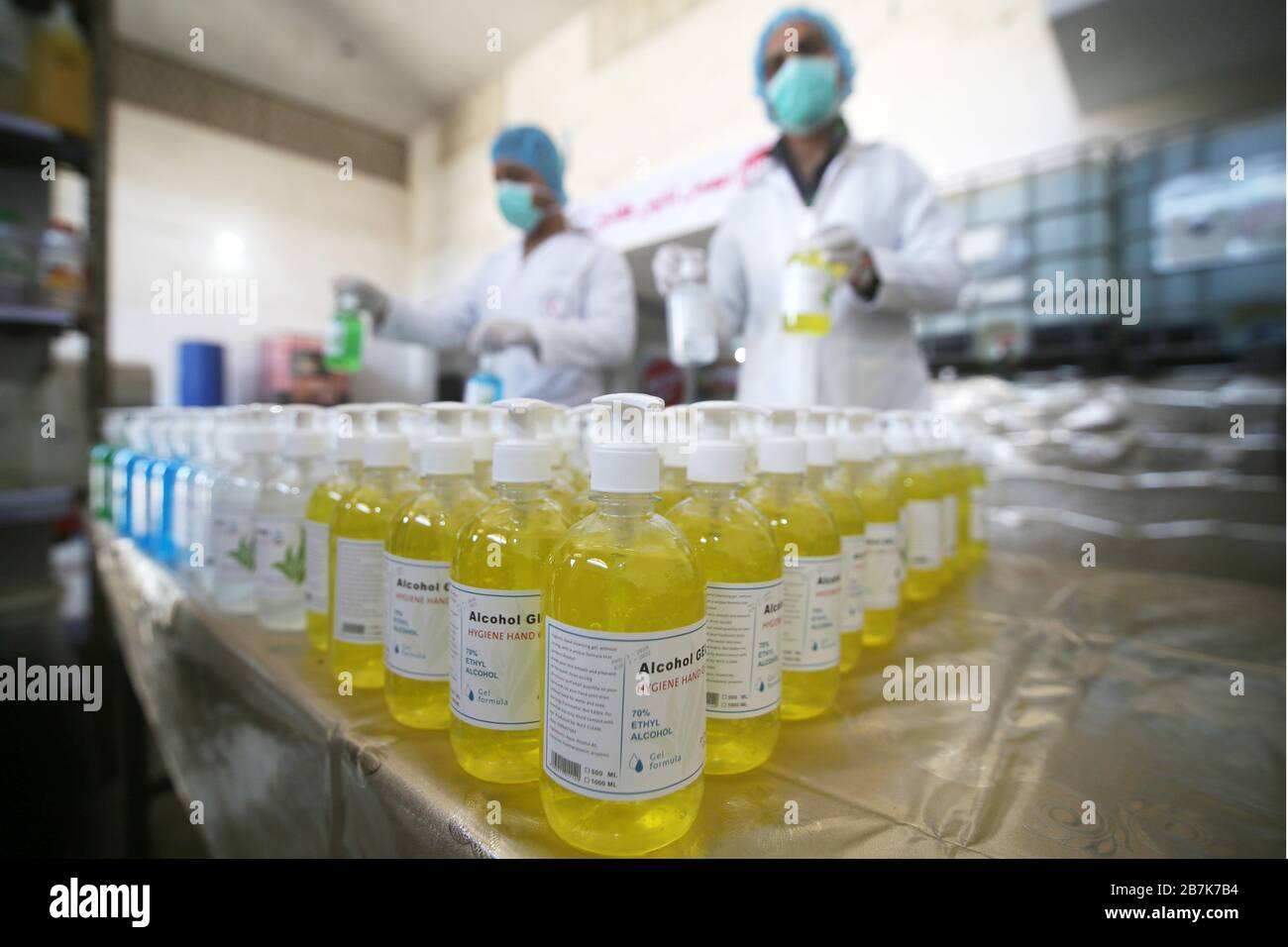 Gaza. 16th Mar, 2020. Palestinian workers work on the production line of sterilizing gel at a cleaning materials factory in the southern Gaza Strip city of Rafah, March 16, 2020. Gaza authorities declared a new set of precautionary measures amid concerns about the spread of the novel coronavirus in the coastal enclave. Credit: Khaled Omar/Xinhua/Alamy Live News Stock Photo