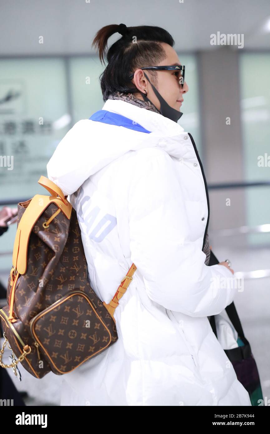 Taiwanese singer and actor Jiro Wang shows up at a Shanghai airport after  landing in Shanghai, China, 6 January 2020. Shorts: Gucci Bag: Louis  Vuitton Stock Photo - Alamy