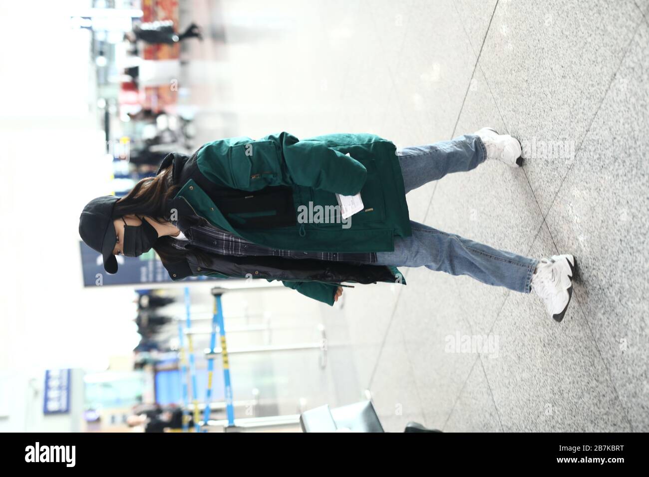 Chinese actress Tan Songyun or Seven arrives at a Beijing airport before  departure in Beijing, China, 19 January 2020. Down Jacket: Kappa Shoes: Ni  Stock Photo - Alamy
