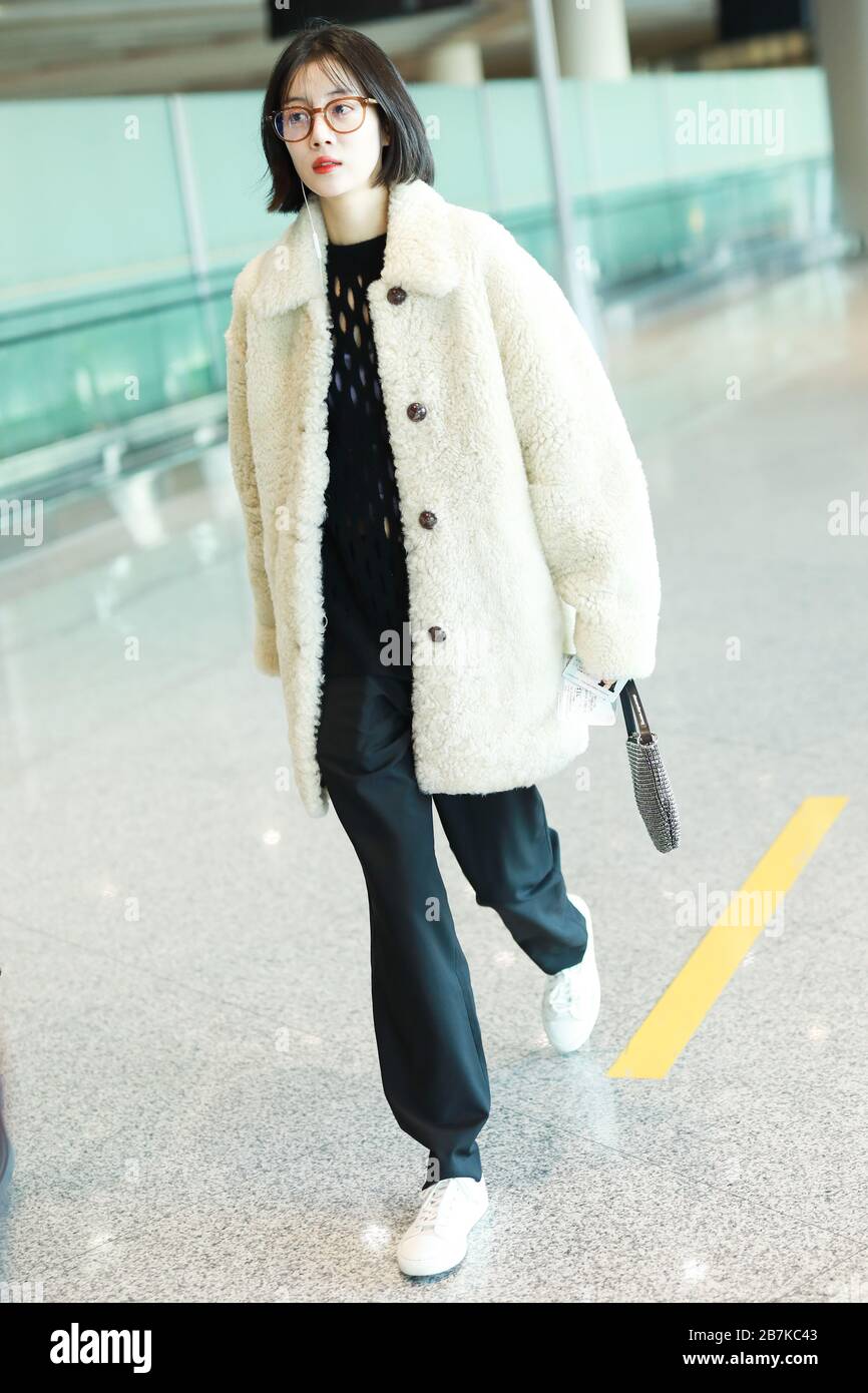Chinese actress and singer Li Xirui arrives at Beijing airport before ...