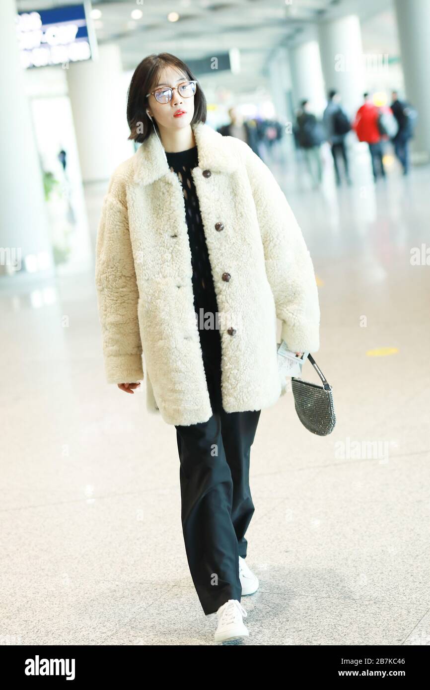 Chinese actress and singer Li Xirui arrives at Beijing airport before ...