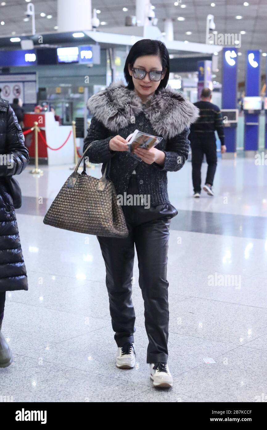 Chinese actress, screenwriter and singer Qin Hailu arrives at Beijing airport before departure in Beijing, China, 20 January 2020. Stock Photo