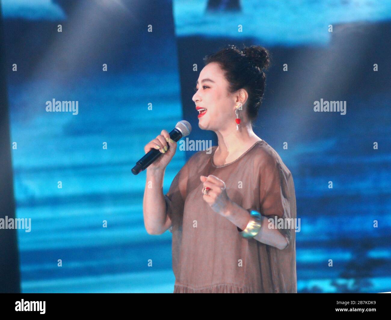 Chinese singer Li Lingyu attends CCTV New Year singing in Beijing ...
