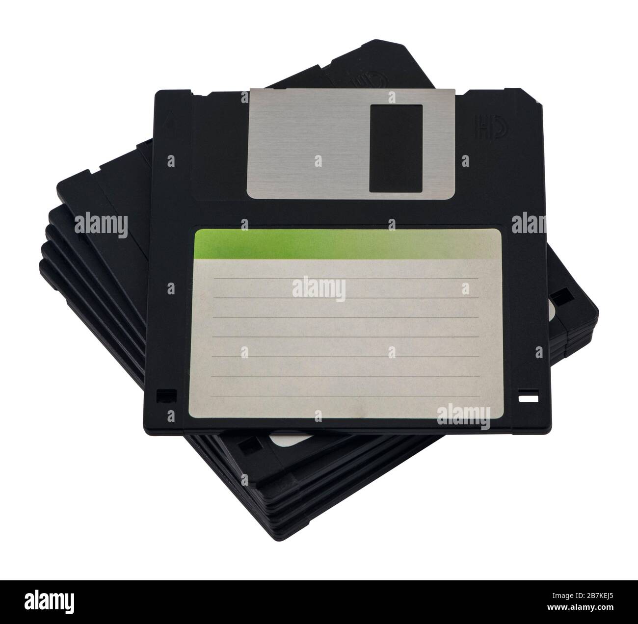 Stacked floppy disks / diskettes isolated on white background. Floppy disc with blank sticker on top. Stock Photo