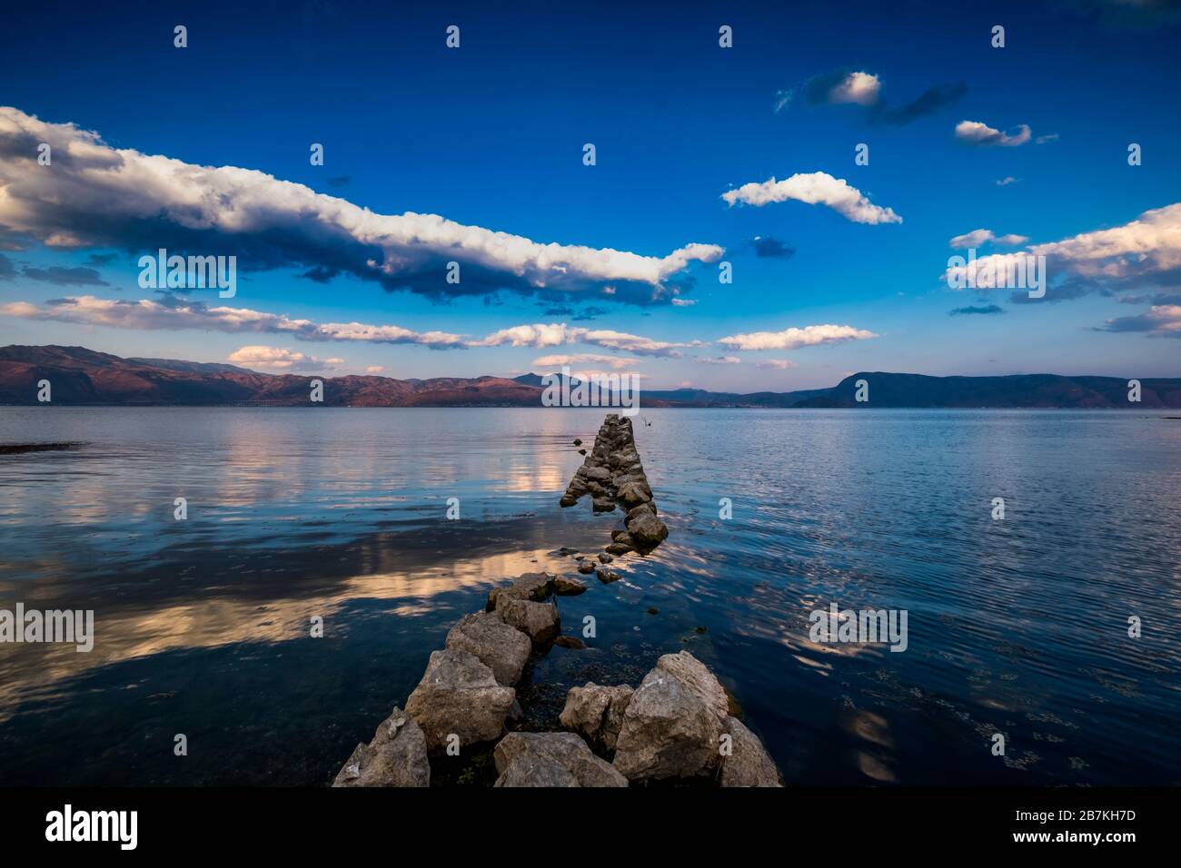 --FILE--The view of sky and sceneries reflected on Erhai, also known as Er Lake, a popular tourist attraction, Dali city, southwest China's Yunnan pro Stock Photo