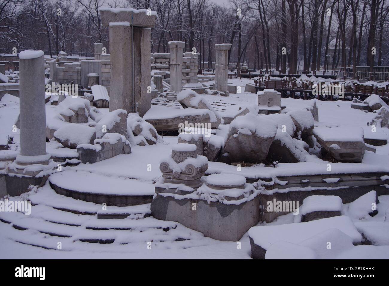 The snow covers debris of the Old Summer Palace, known in Chinese as