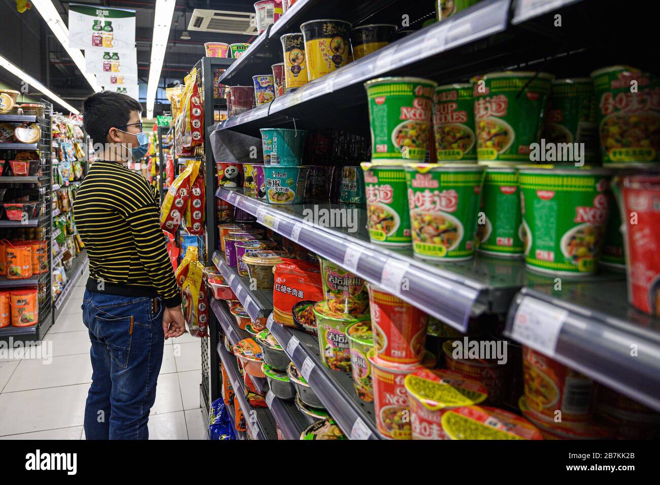 A person shops for instant noodles at a supermarket in Guangzhou city,  south China's Guangdong province, 13 February 2020 Stock Photo - Alamy