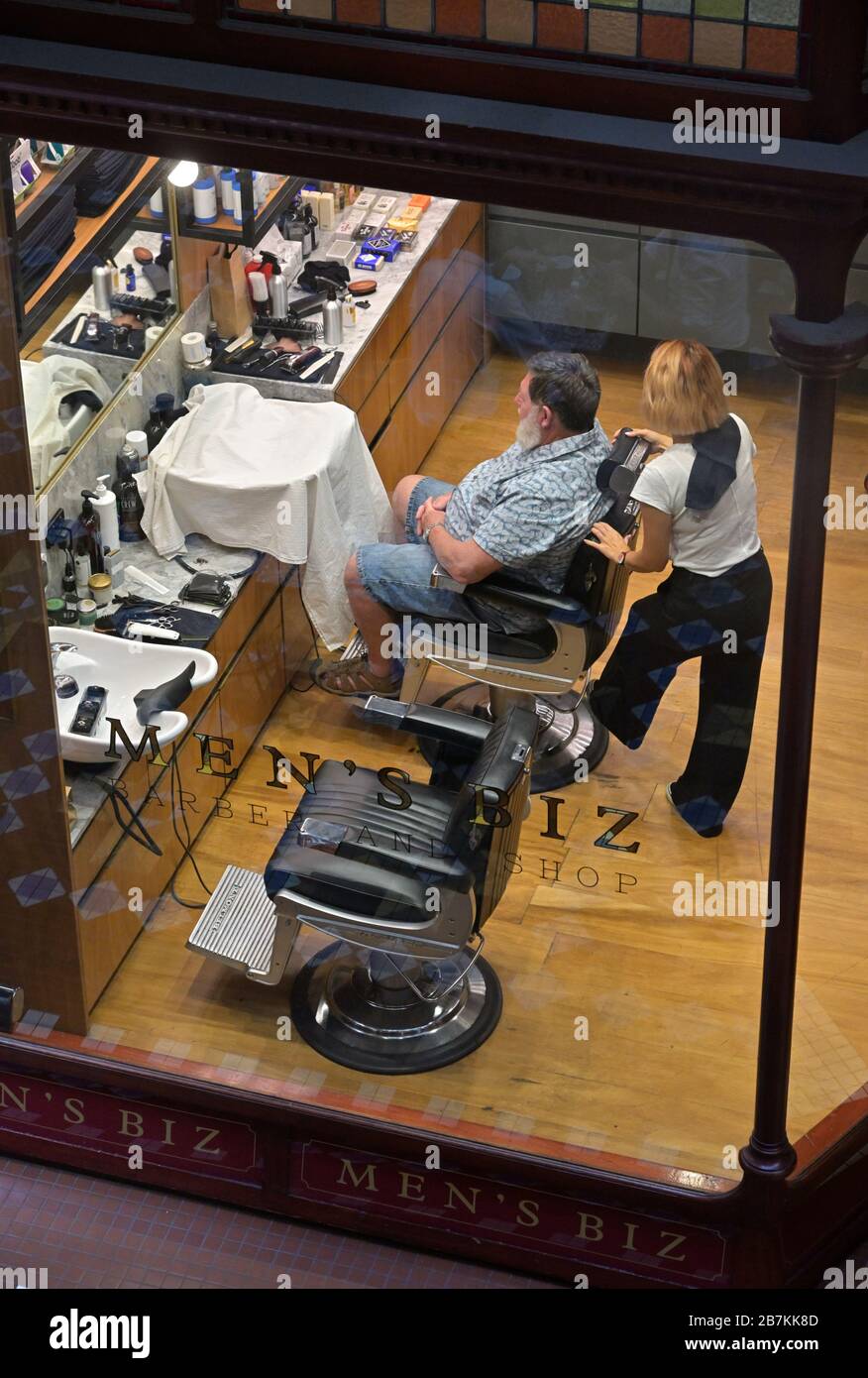 Men's Biz barber at the historic Strand Arcade, Sydney NSW Stock Photo