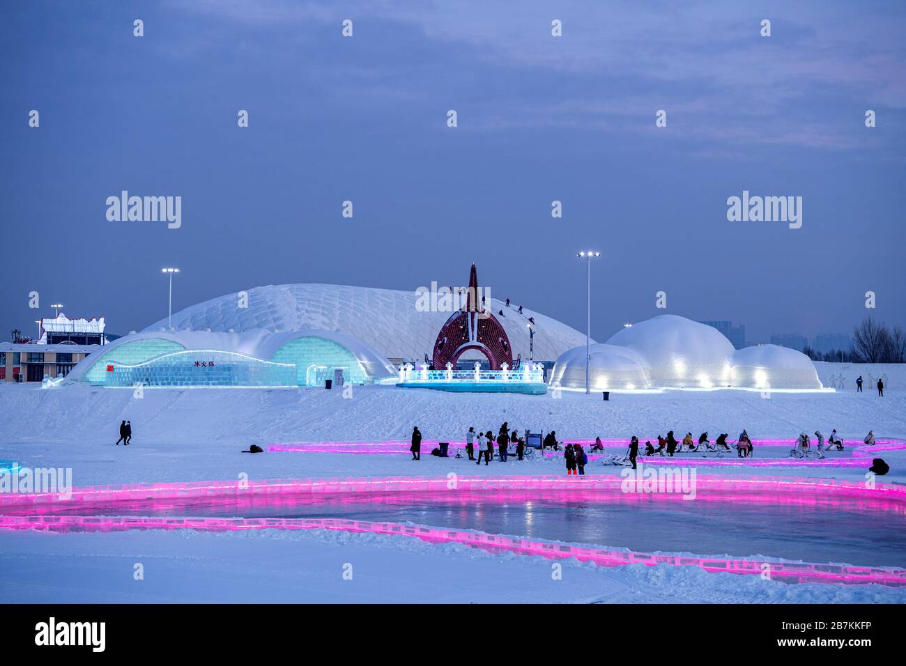  file visitors enjoy the ice sculptures resembling various shapes