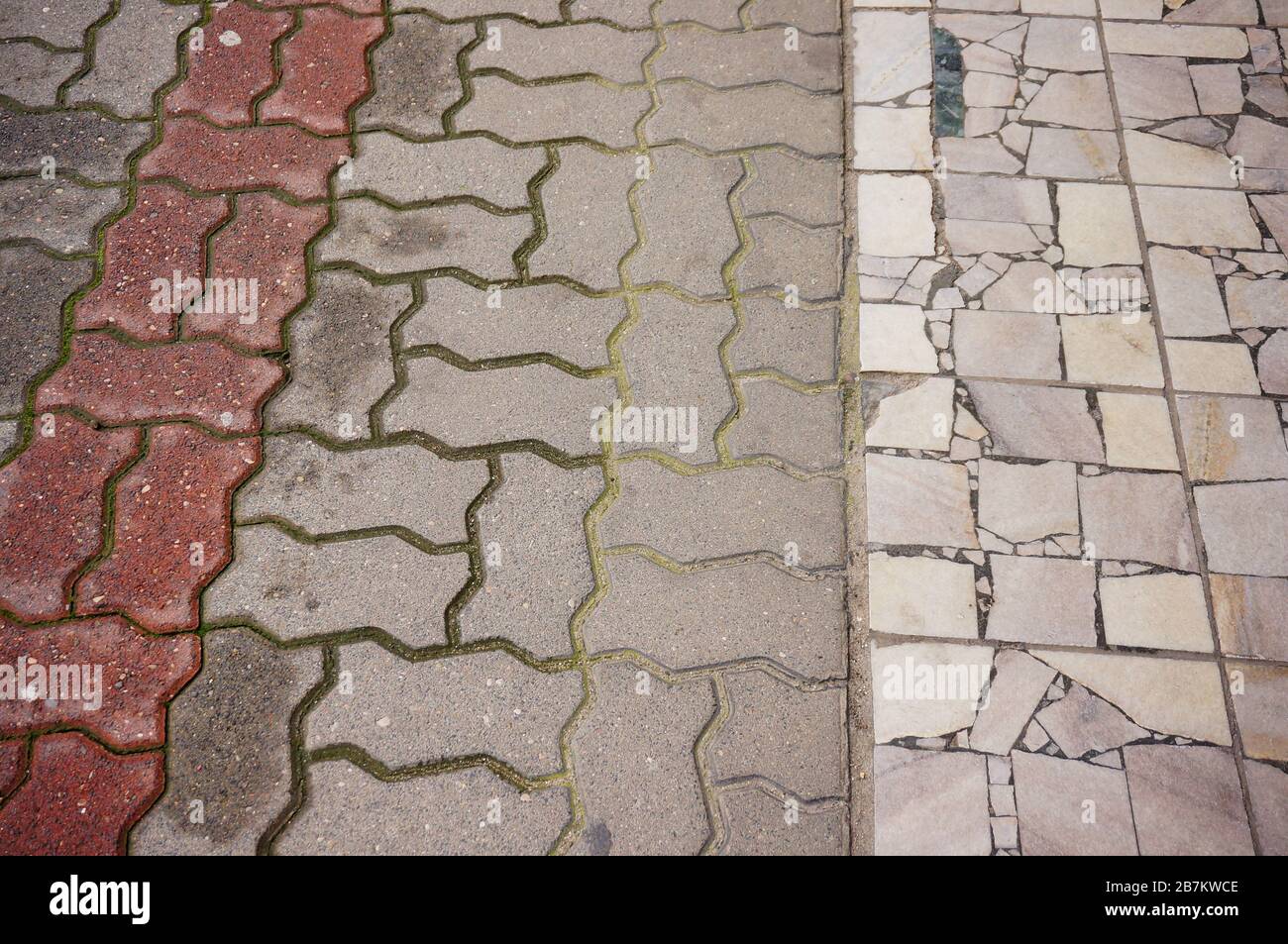 High angle shot of a cobblestone ground with tiles of different patterns Stock Photo