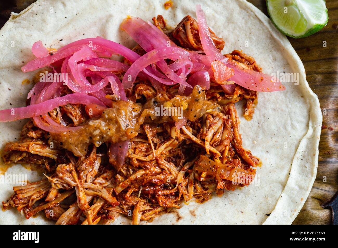 Mexican Tacos of Cochinita Pibil, pitroasted marinated pork, served