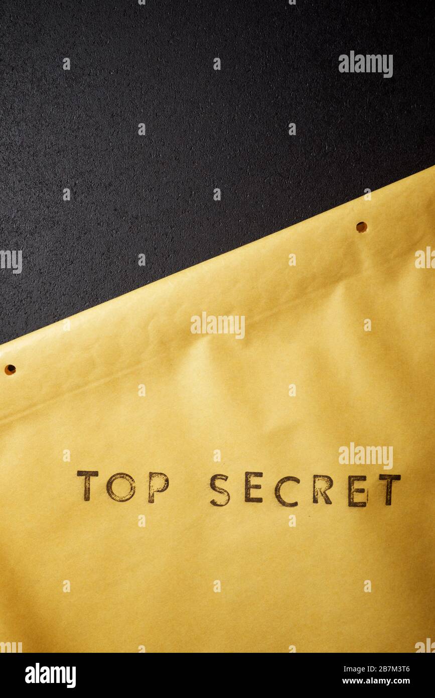 Top secret sentence on a brown envelope Stock Photo Alamy