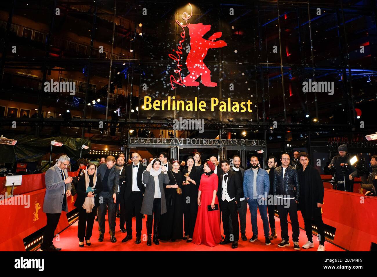 Cast and Crew of THERE IS NO EVIL ( Sheytan Vojud Nadarad ) poses with their award Golden Bear for Best Film  on the Red Carpet at the Closing Ceremony and Awards for the 70th Berlin International Film Festival ( Berlinale ) on Saturday 29 February 2020 at Berlinale Palast, Potsdamer Platz, Berlin. . Picture by Julie Edwards. Stock Photo