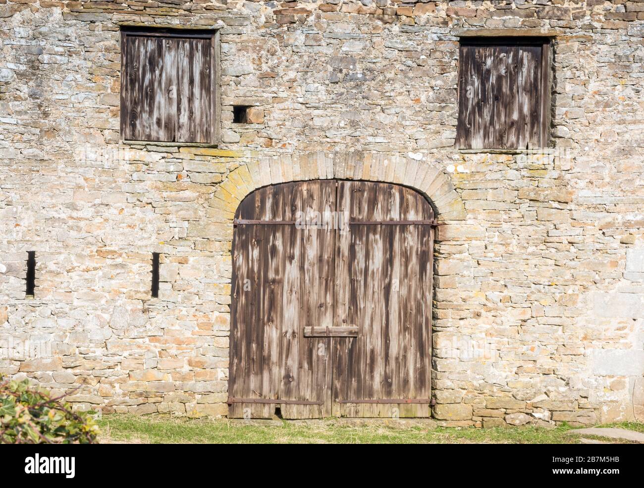 Stone barn door and windows Stock Photo Alamy