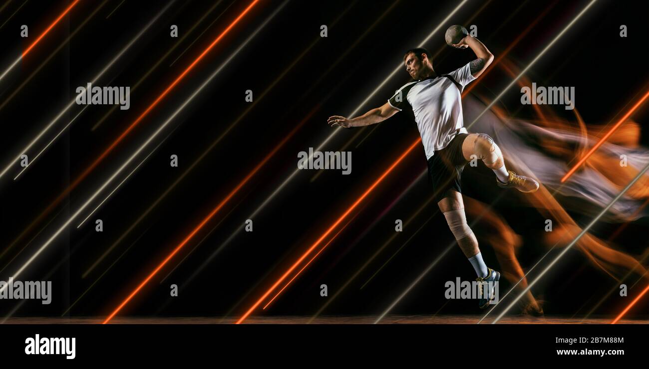 Creative Sport And Neon Lines On Dark Background Flyer Proposal Male Handball Player Training In Action And Motion Concept Of Hobby Healthy Lifestyle Youth Action Movement Modern Style Stock Photo Alamy