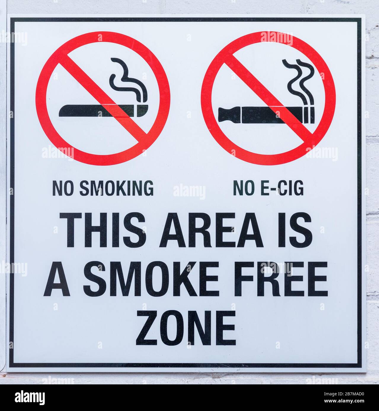 This Area is a Smoke Free Zone Sign with no smoking symbols Stock Photo