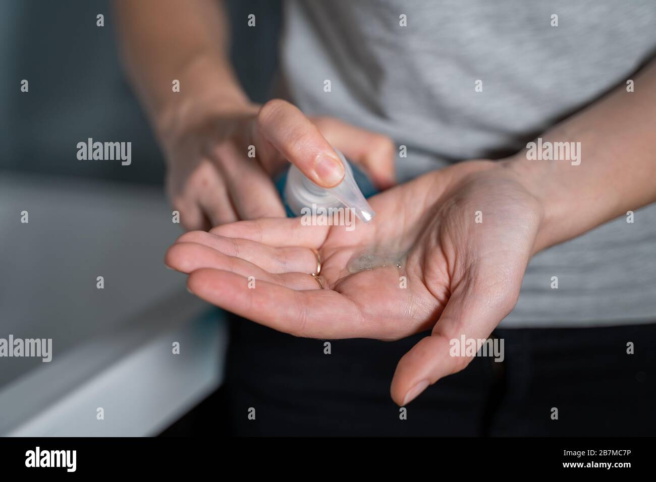 Woman washing her hands at home with antibacterial soap Stock Photo - Alamy