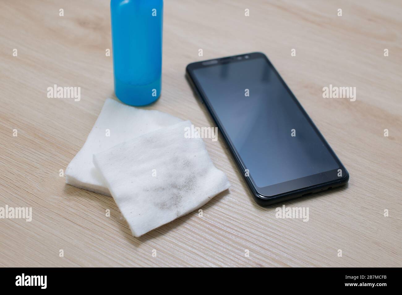 cleaning Mobile Phones for Covid19 disease prevention. alcohol