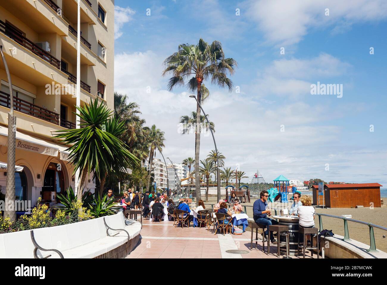 Dining on the paseo maritimo, the seaside promenade, Estepona, Costa del Sol, Malaga Province, Andalusia, southern Spain. Stock Photo
