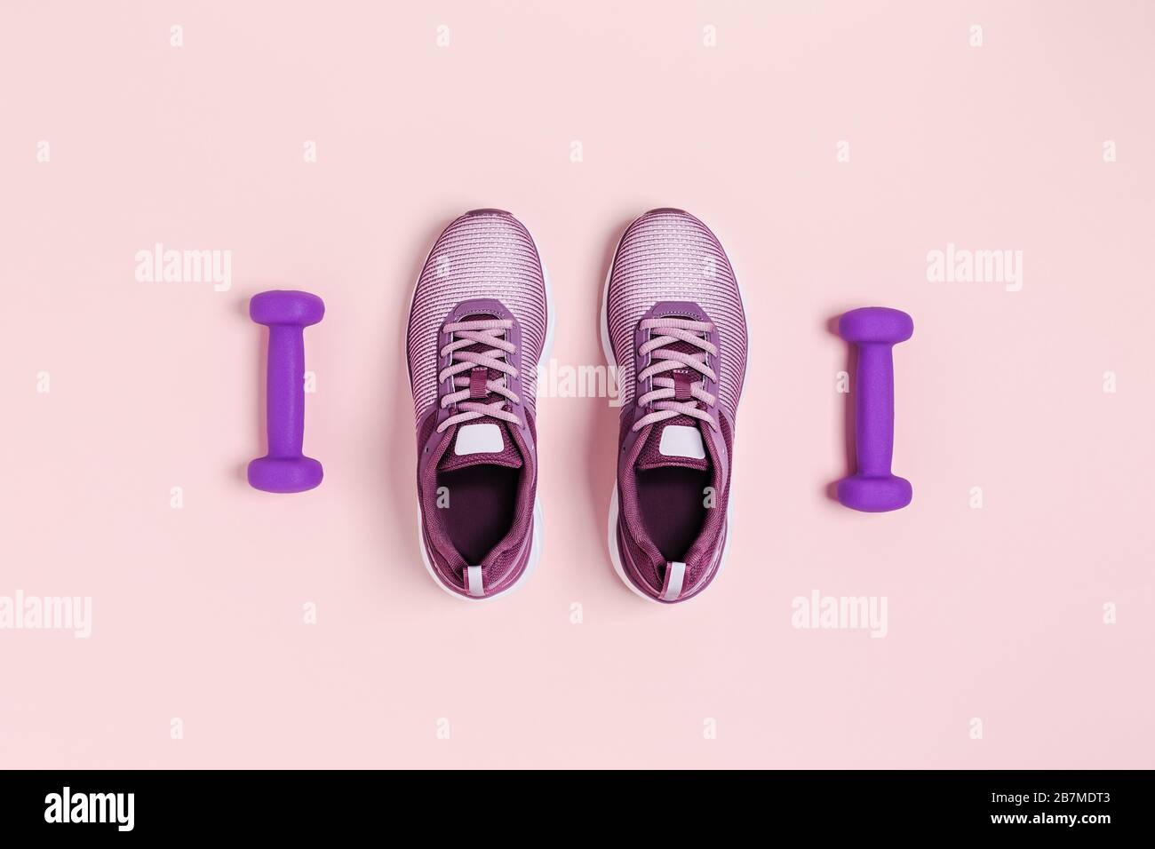 Female Sport Equipment On A Pink Background Stock Photo - Download