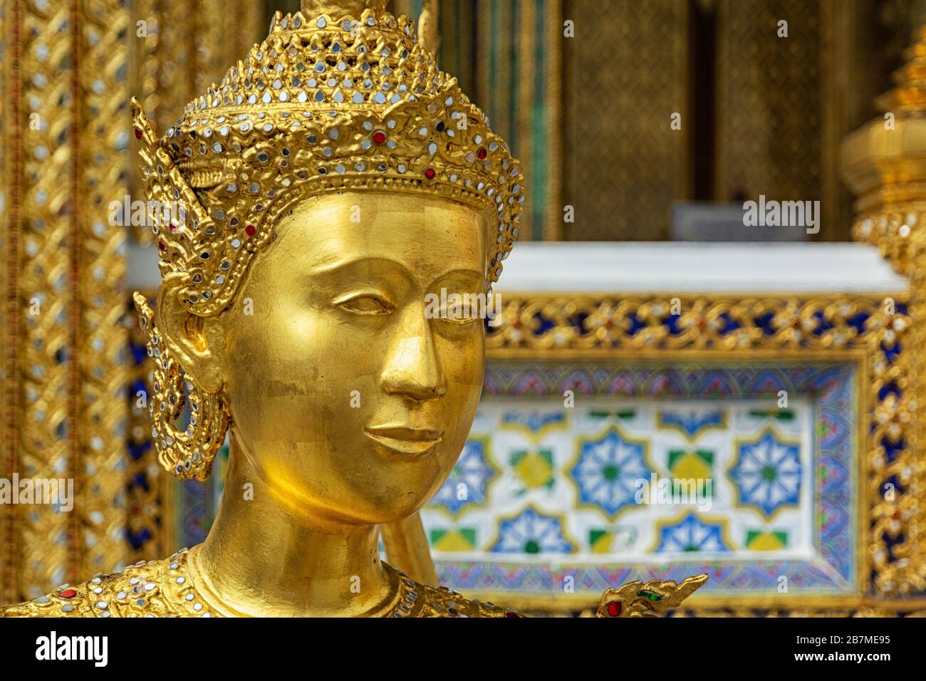 Gold sculptures in the grand palace in Bangkok, Thailand Stock Photo