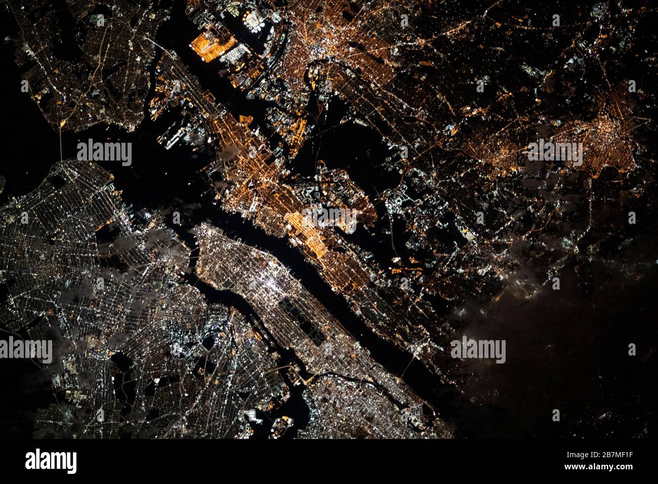 NEW YORK, USA - 28 Feb 2020 - The well-lit New York and New Jersey metropolitan area is viewed during the early morning hours as the International Spa Stock Photo