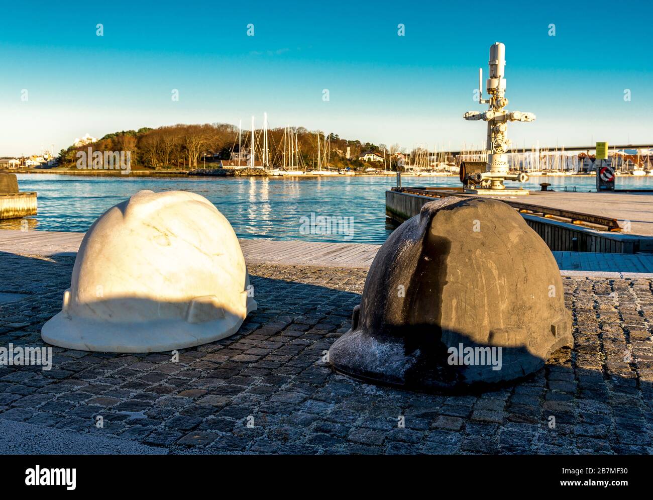 Oilfield offshore hard hats displayed at Georparken playground next to Petroleum museum in Stavanger city centre, Norway, December 2017 Stock Photo