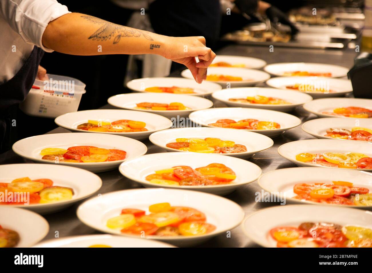 Adding salt cooking hires stock photography and images Alamy