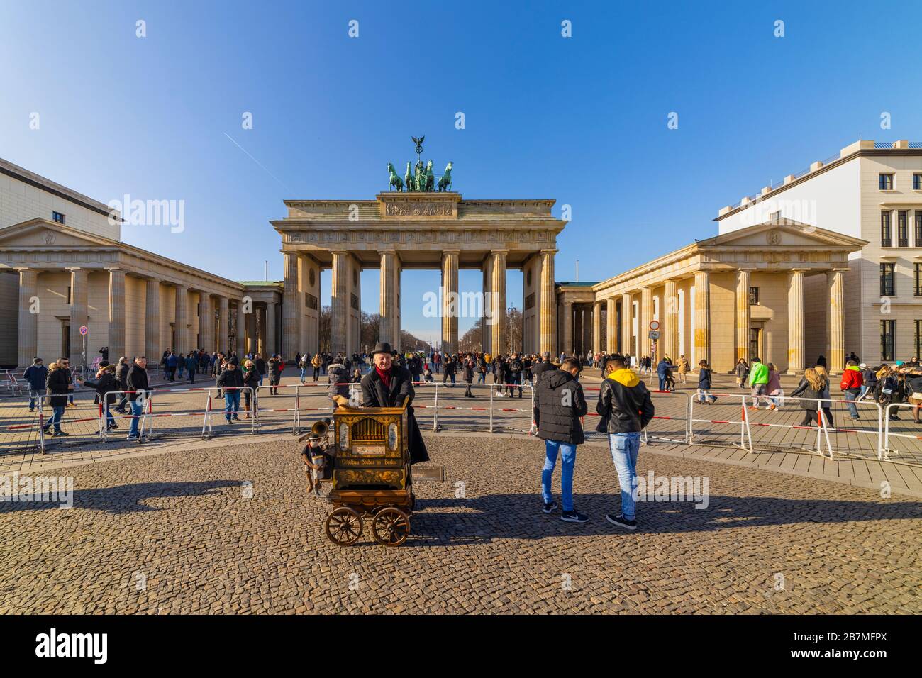 Berlin, Germany - February 9, 2020: Tourists near the Brandenburg Gates or Brandenburger Tor Stock Photo