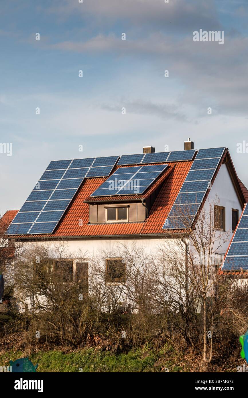 House with a lot of solar panels on the roof Stock Photo