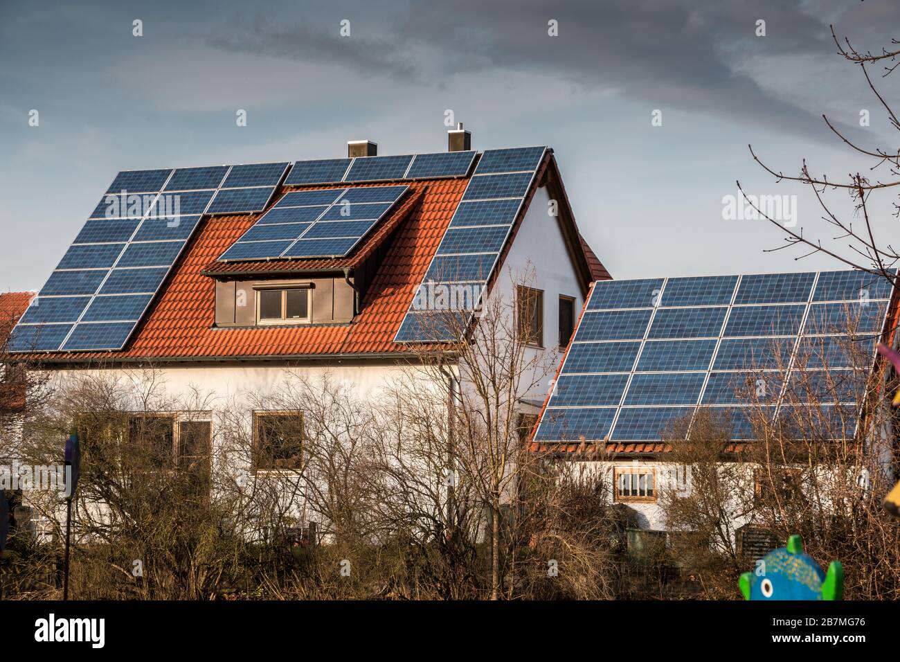 House with a lot of solar panels on the roof Stock Photo