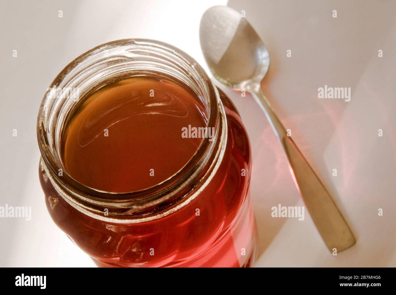 Honey is a sweet, viscous food made by honey bees. It is both healthy and delicious. Stock Photo