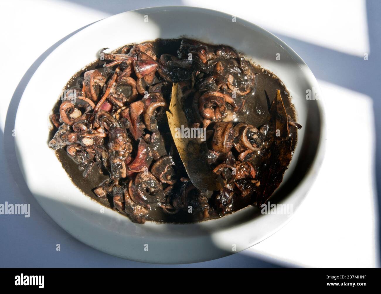 Squid adobo stew Stock Photo
