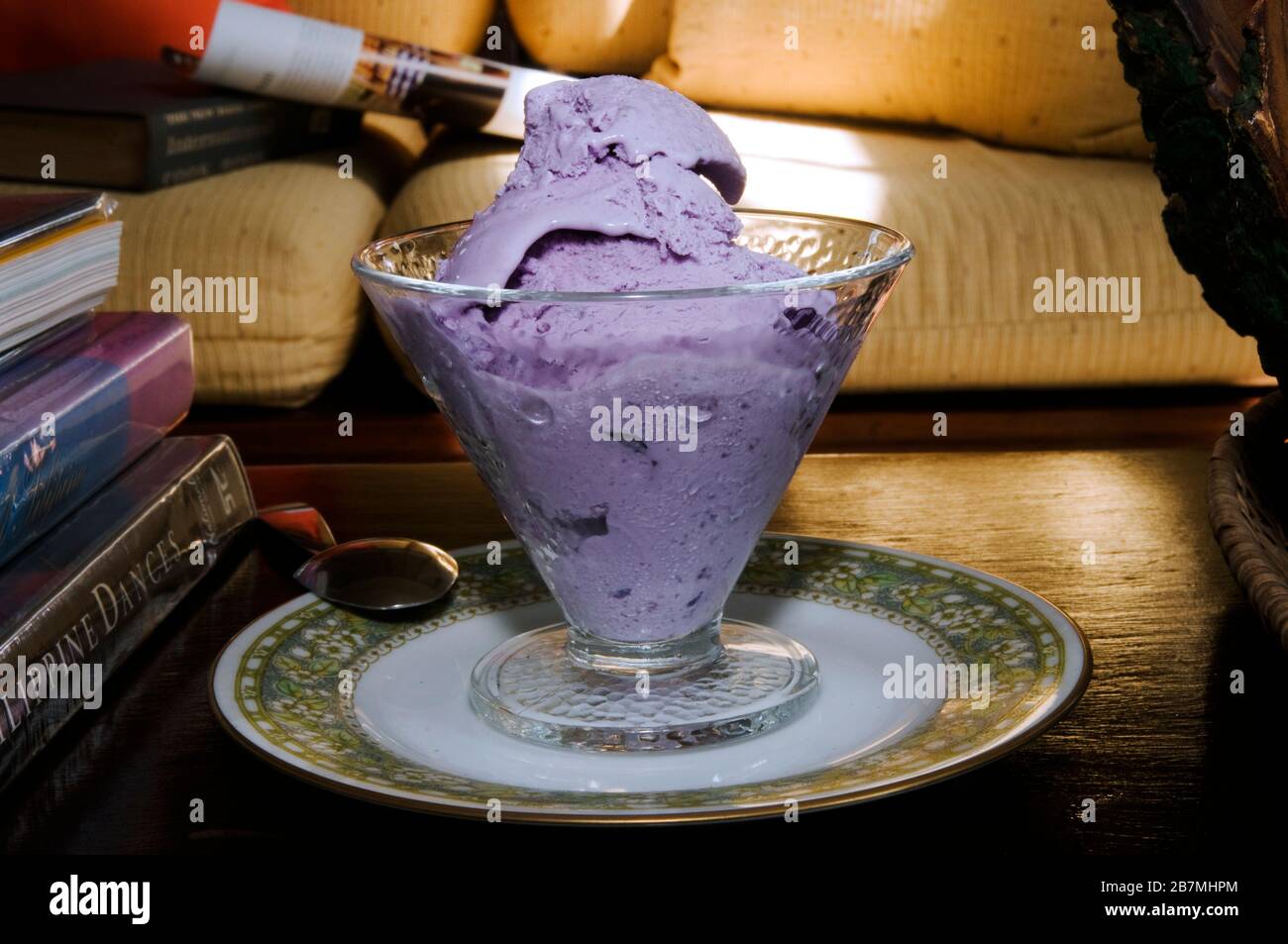 Ice cream is a frozen dairy dessert made with milk or cream and in a variety of flavors. Always a yummy treat. This is purple yam flavored ice cream. Stock Photo