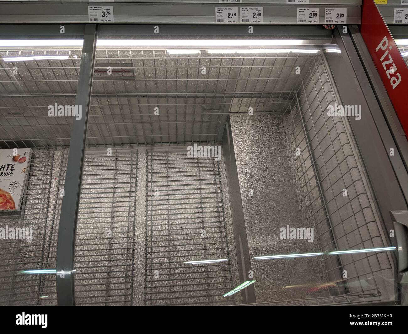 Empty pizza freezer cabinets at frozen food section in supermarket ...
