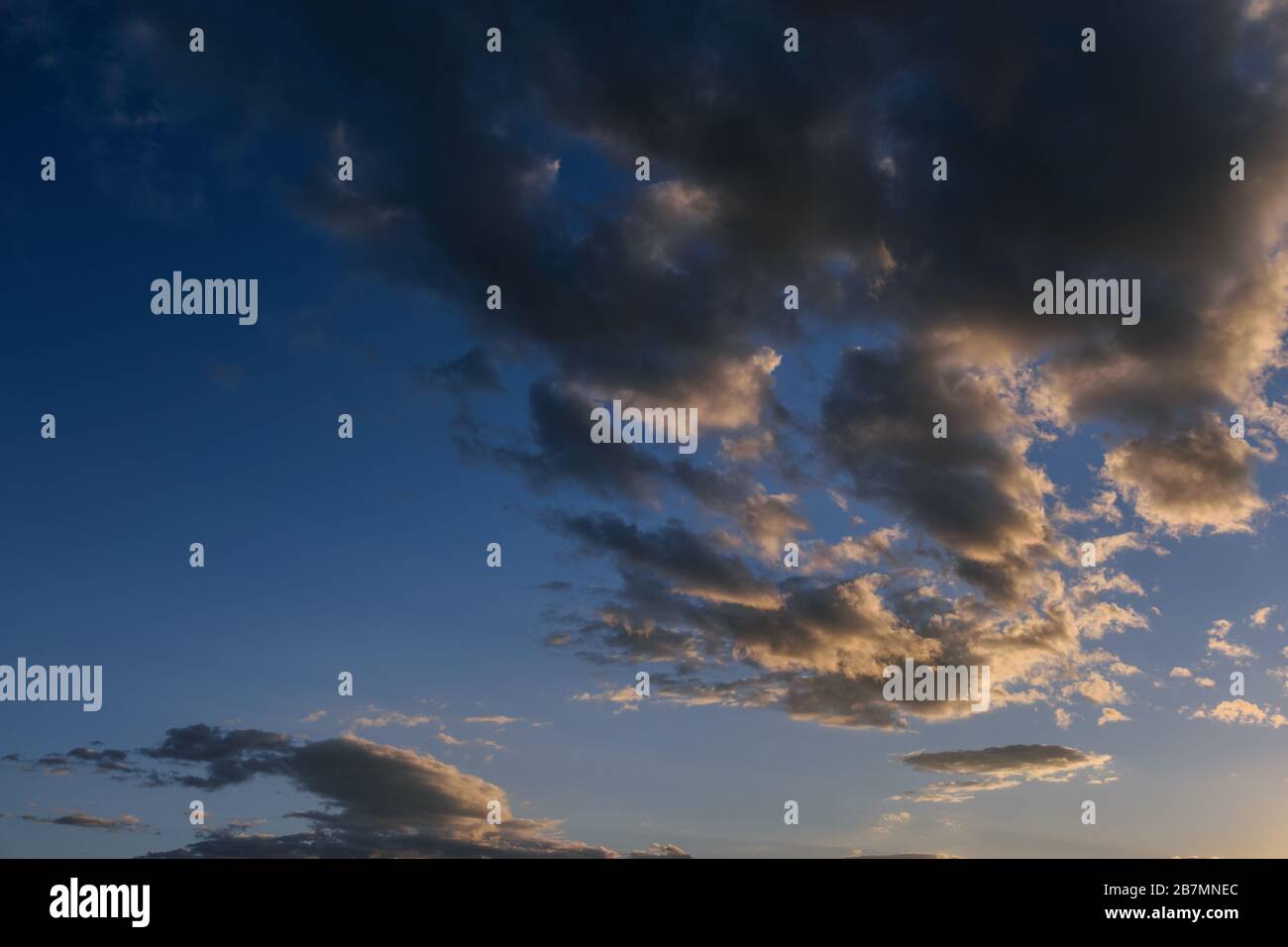 Blue sky with dark clouds. Nature background Stock Photo - Alamy